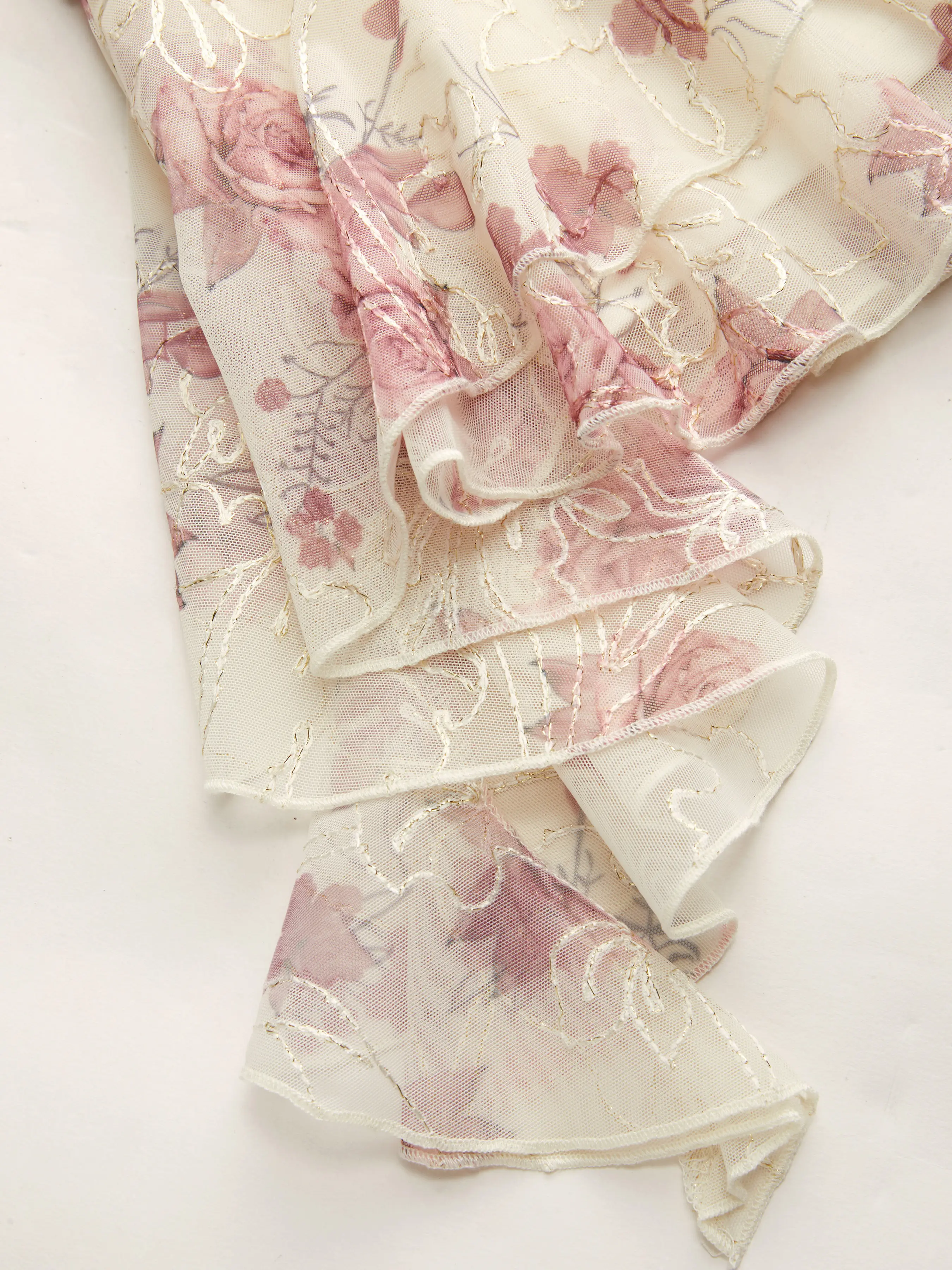 10045-mesh-mid-rise-floral-asymmetrical-ruffle-hem-mini-skirt-1.webp
