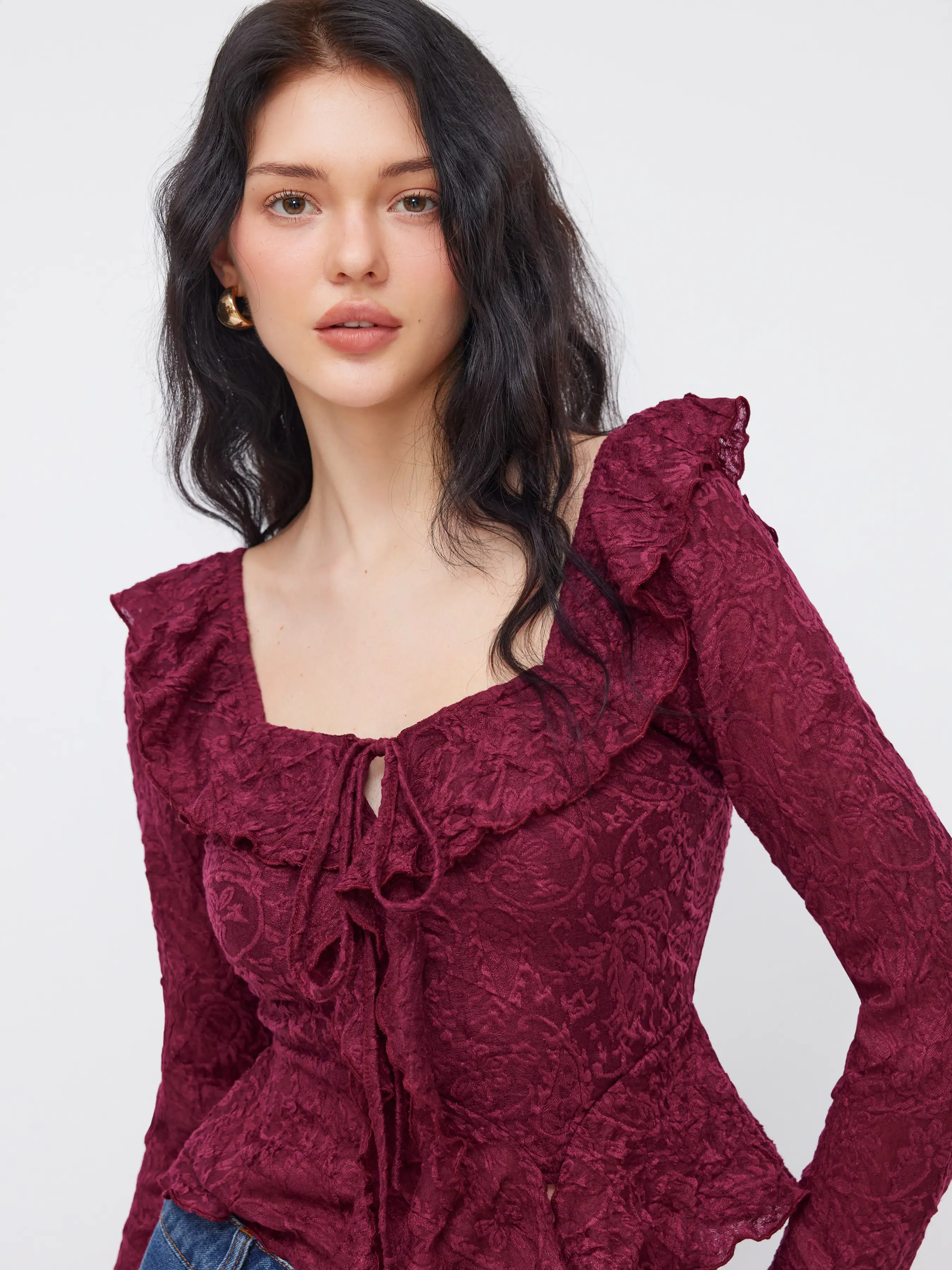 11128-lace-sweetheart-floral-lettuce-trim-peplum-hem-long-sleeve-top-1.webp