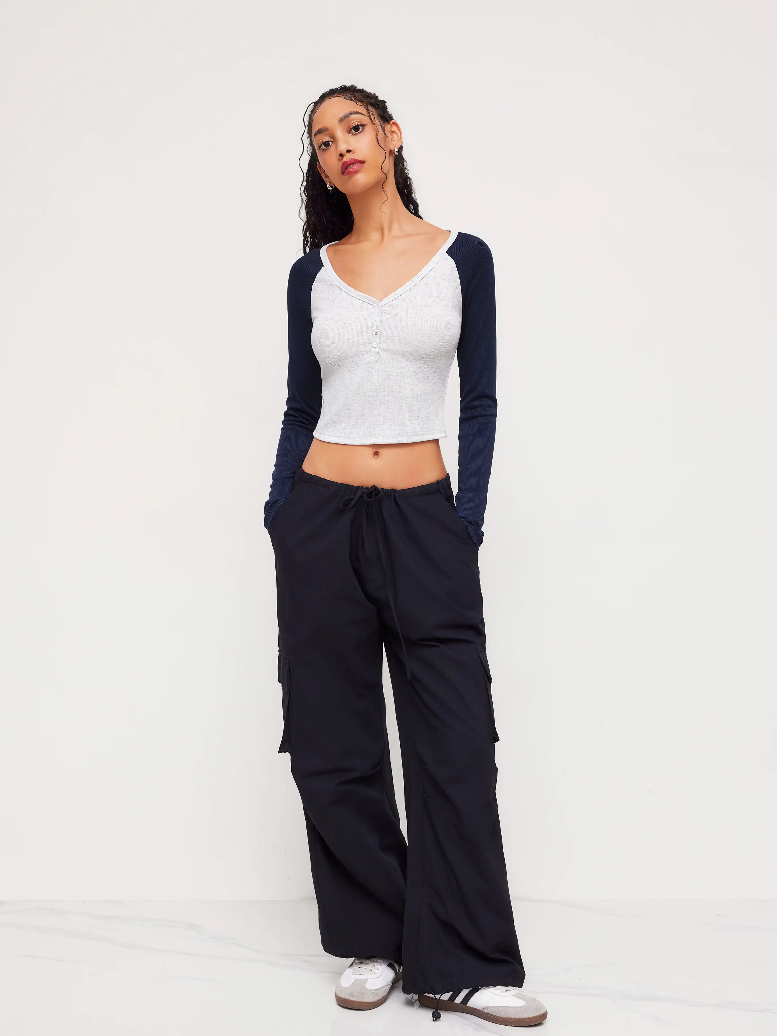 11646-v-neck-solid-button-raglan-sleeve-jersey-top-1.webp