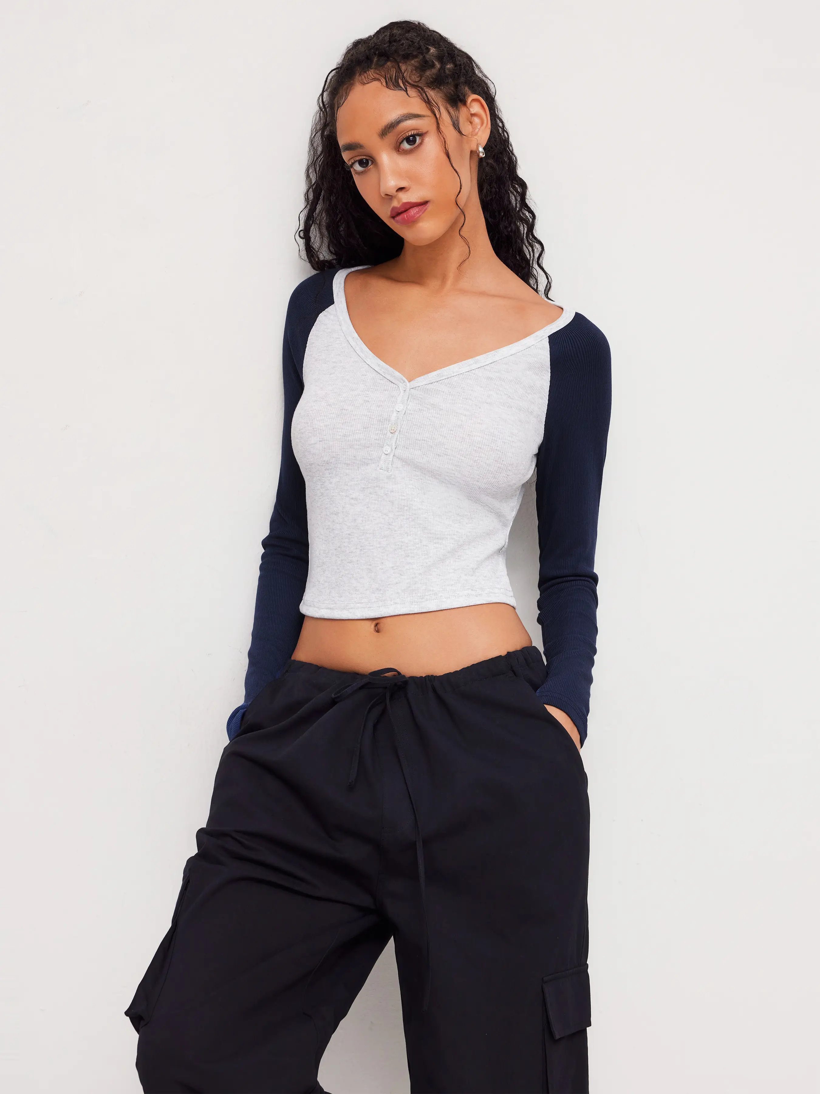11646-v-neck-solid-button-raglan-sleeve-jersey-top-1.webp