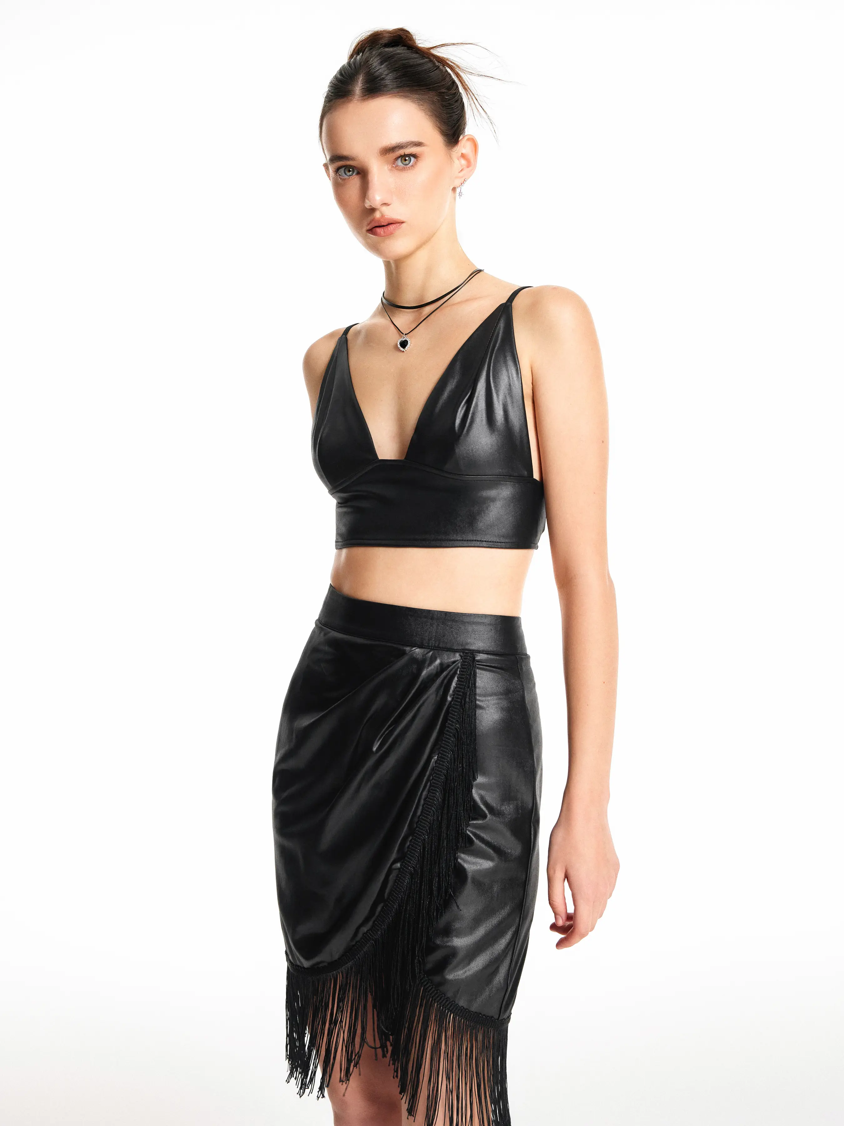 12145-faux-leather-solid-v-neck-zip-up-crop-cami-top-1.webp