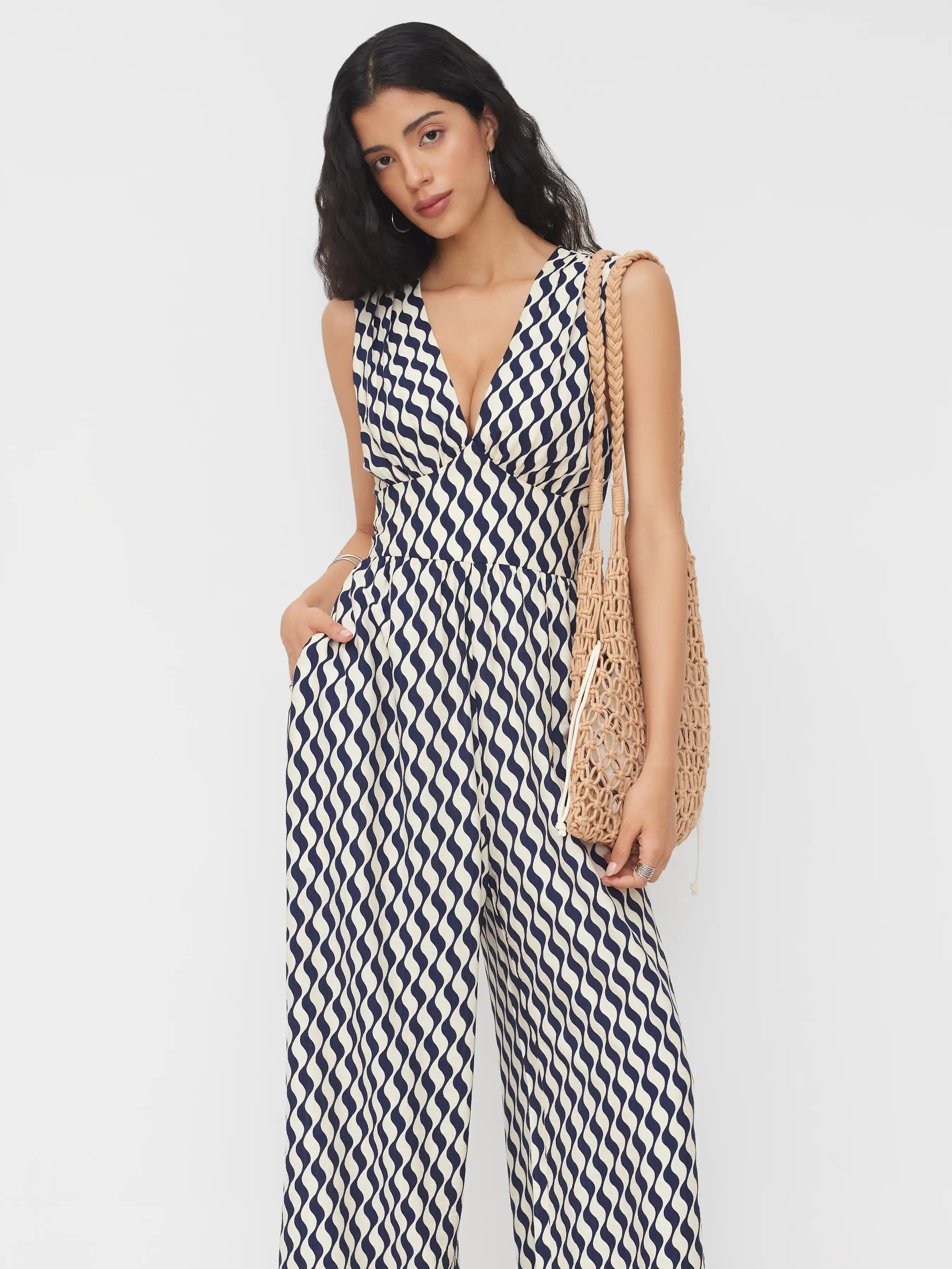 13538-v-neck-abstract-knotted-back-wide-leg-jumpsuit-1.webp