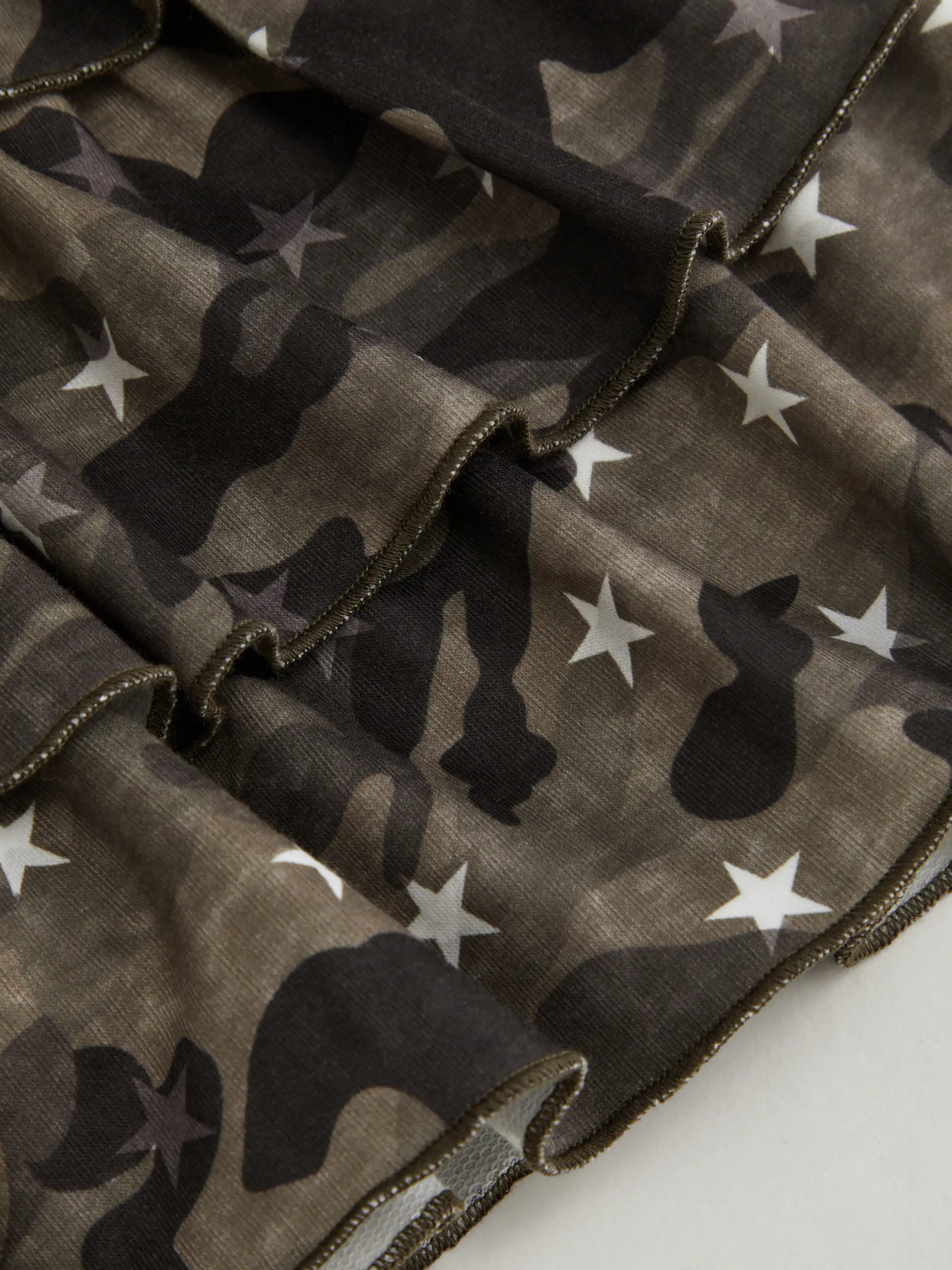 3150-jersey-mid-rise-camo-drawstring-rara-mini-skirt-1.webp