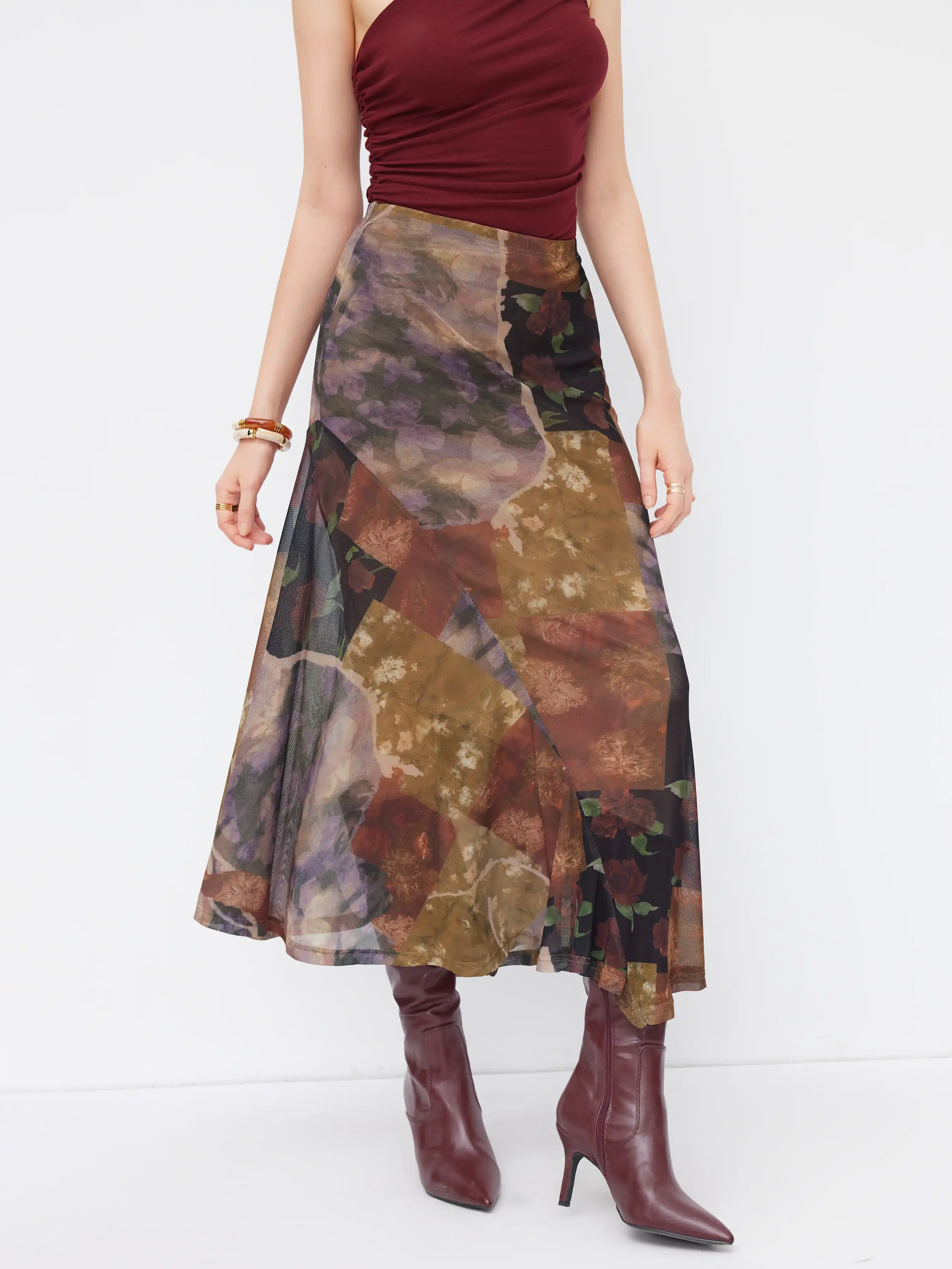 325-mesh-mid-rise-abstract-graphic-floral-asymmetrical-hem-maxi-skirt-1.webp