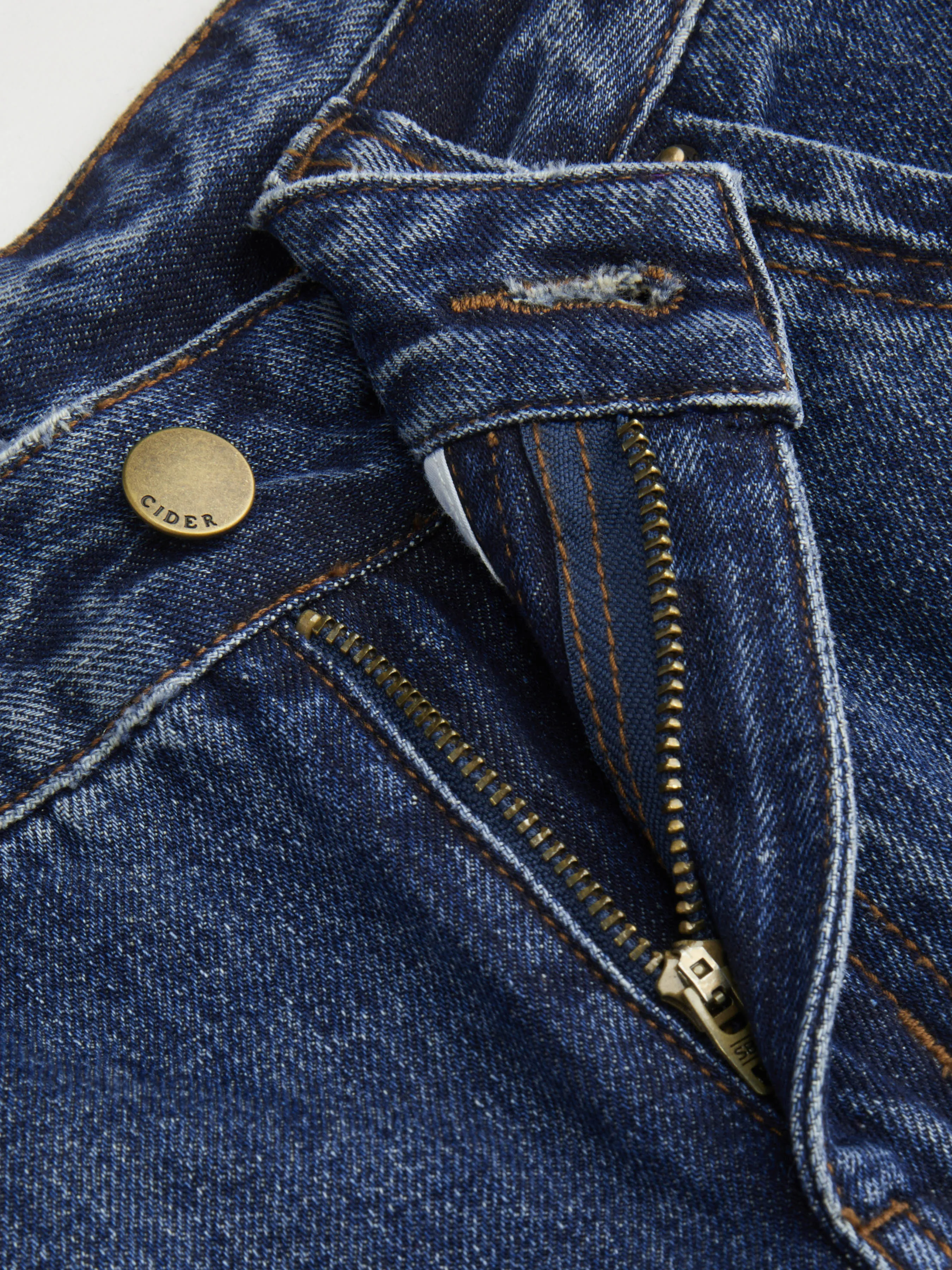 3320-petite-cider-denim-low-rise-flared-jeans-1.webp