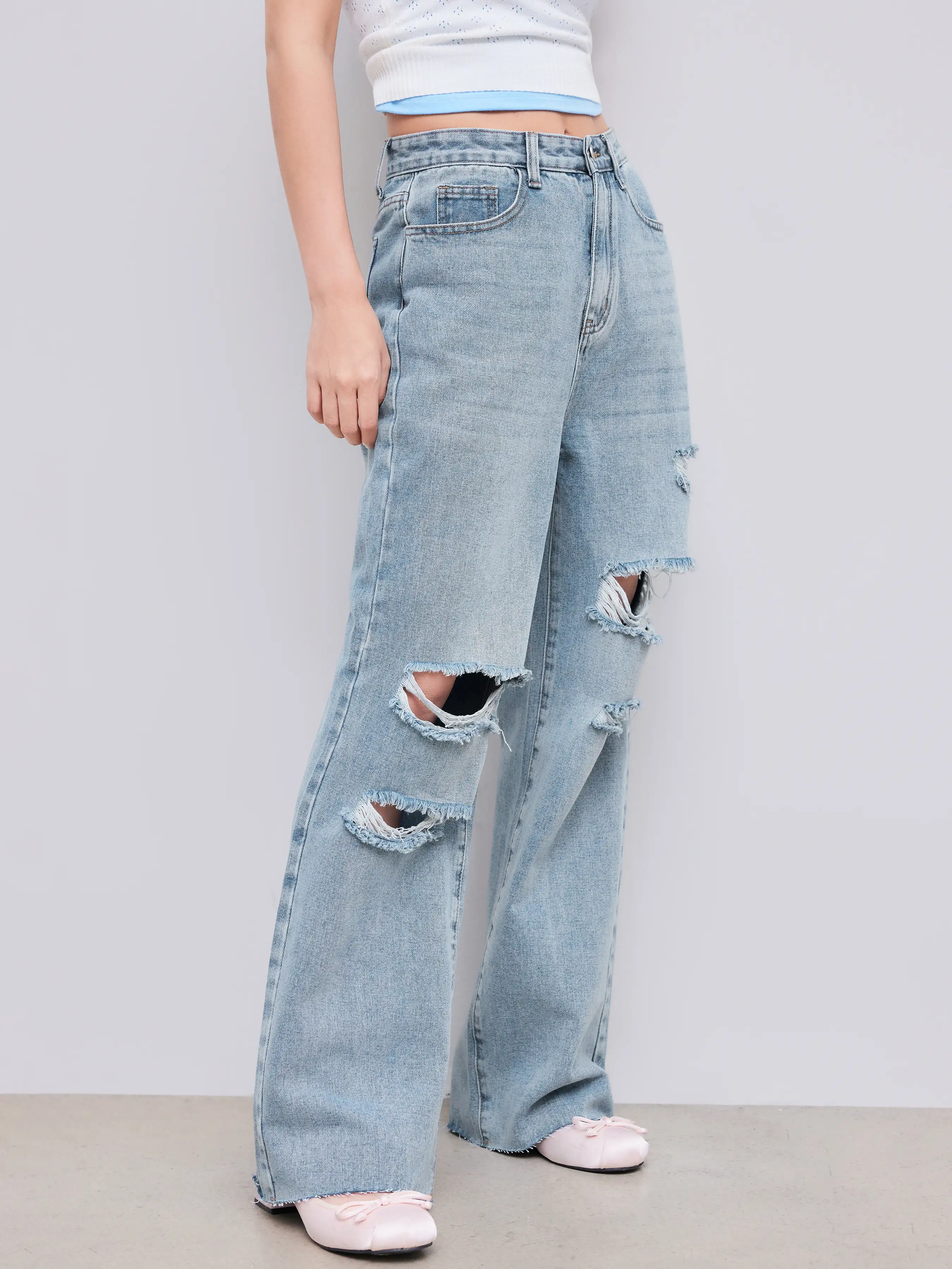 Mid Rise Ripped Straight Leg Jeans