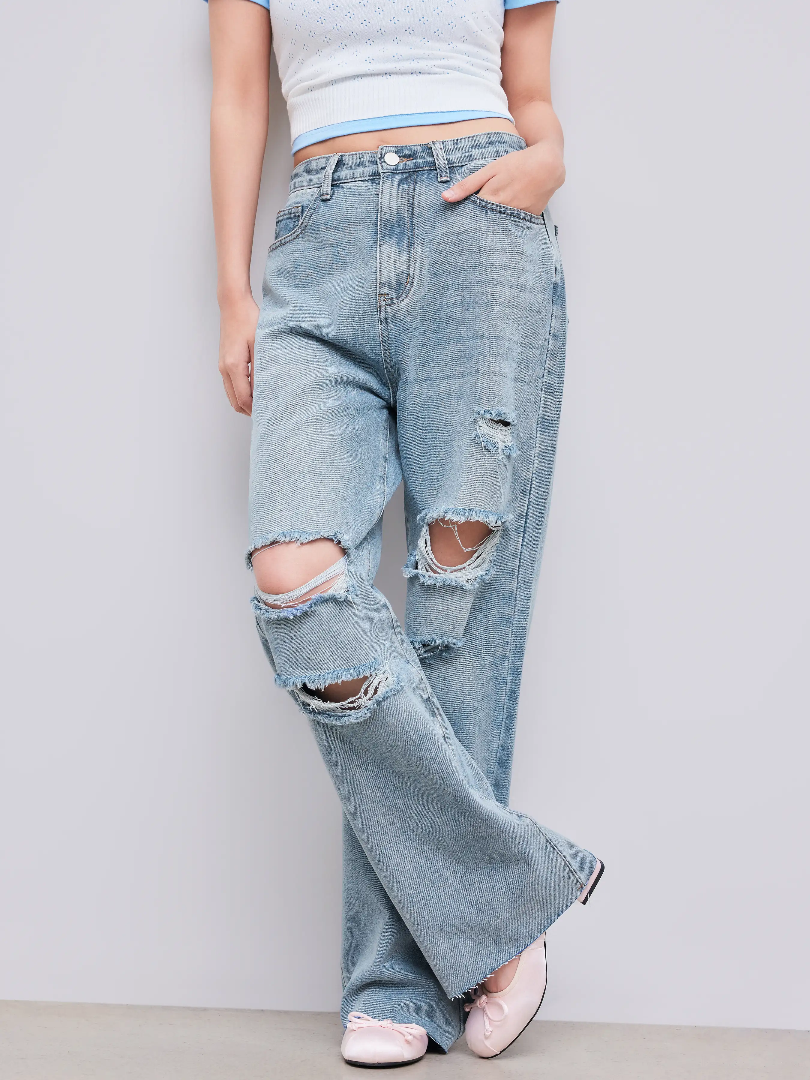 Mid Rise Ripped Straight Leg Jeans