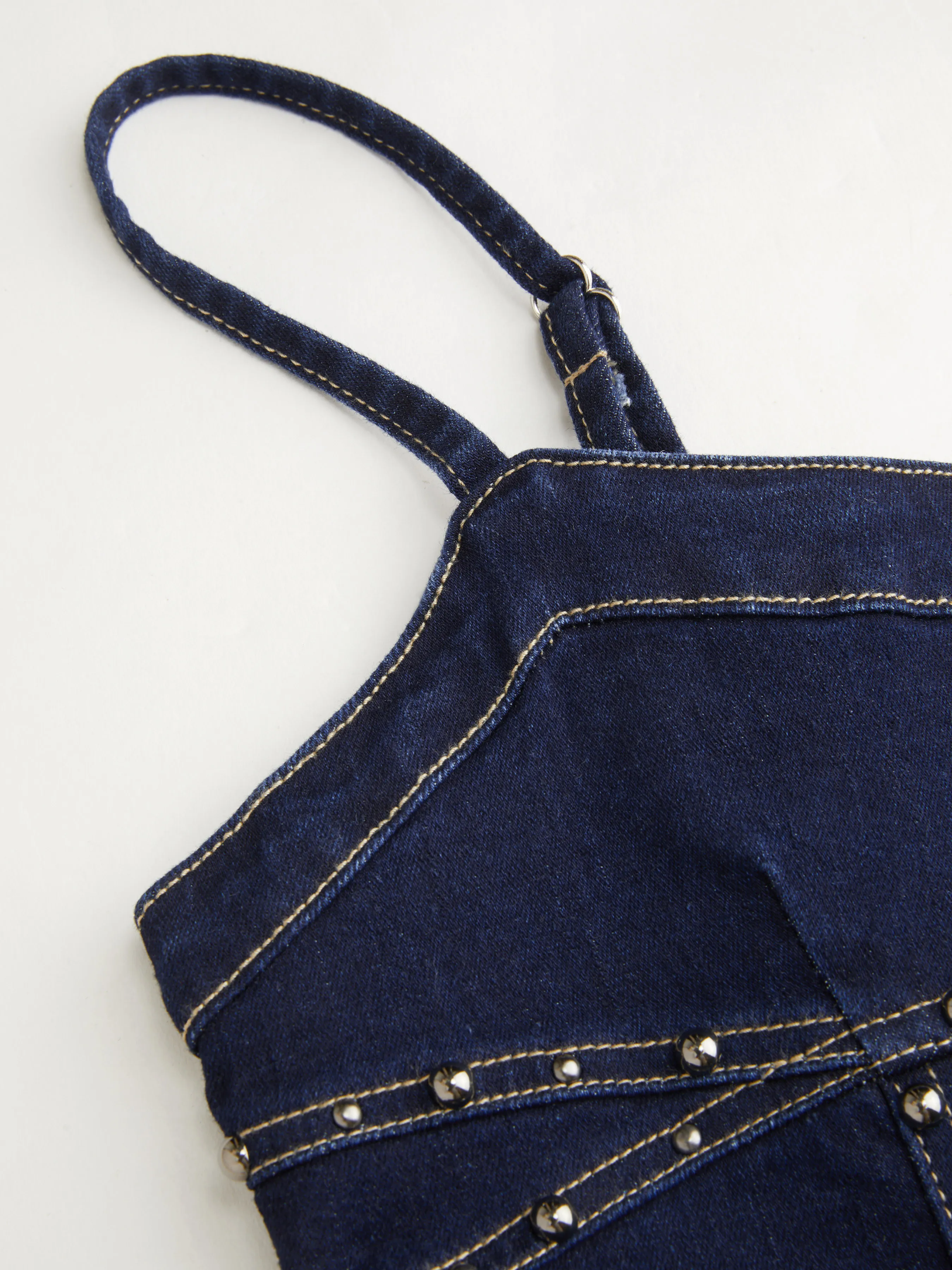 3689-high-stretch-denim-rivet-detail-zipper-mini-dress-1.webp