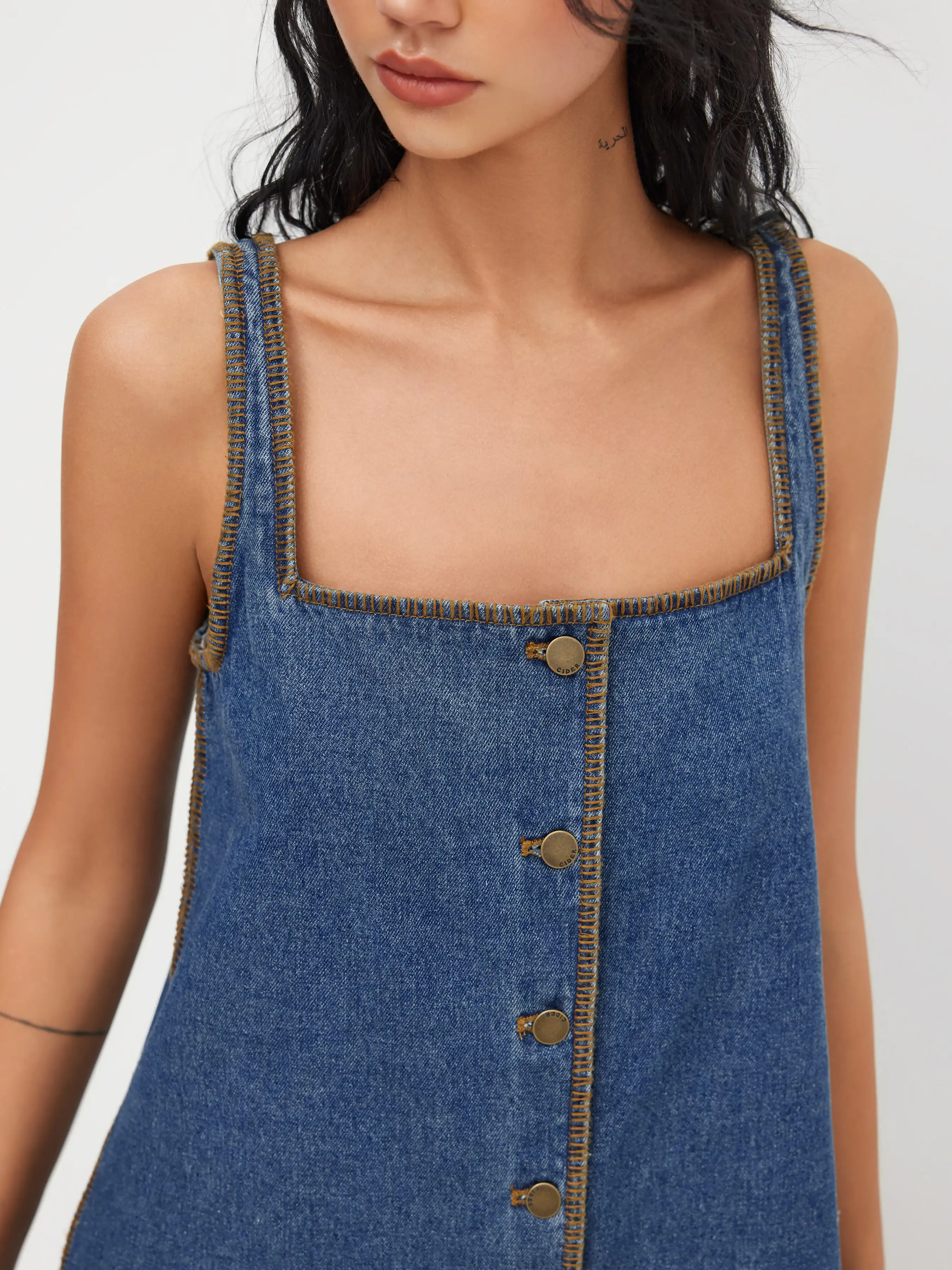 5193-denim-button-contrasting-stitch-pinafore-mini-dress-1.webp
