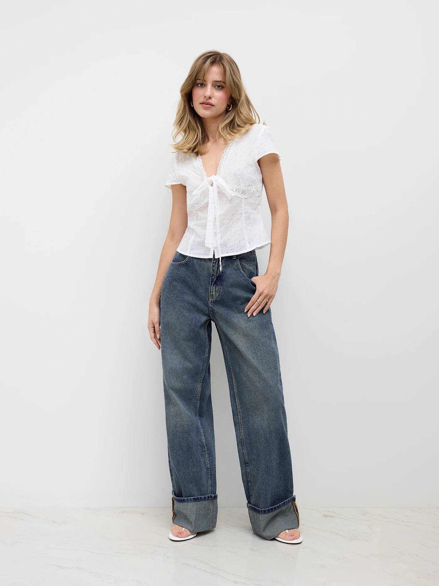 5206-middle-waist-solid-button-wide-leg-jeans-1.webp