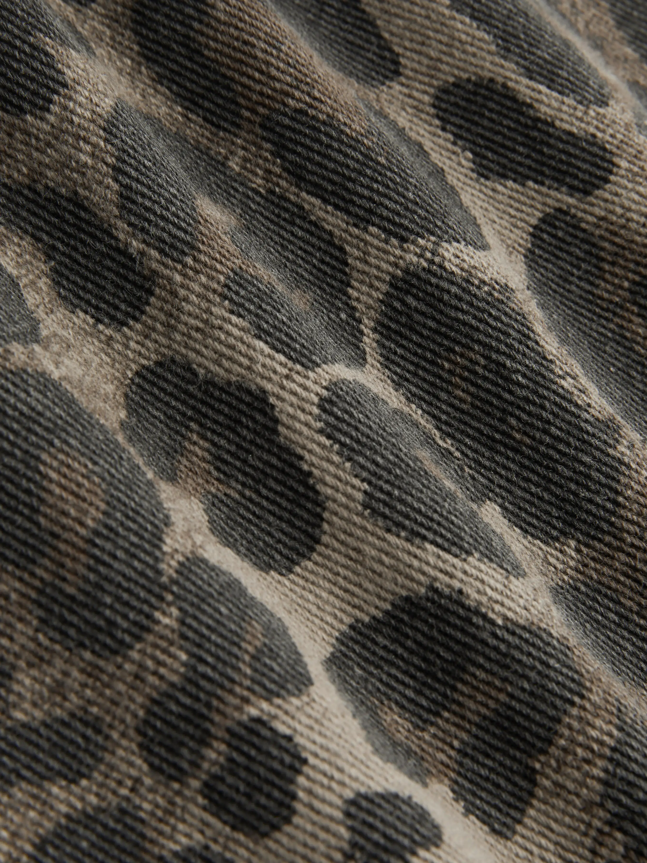 5601-cider-denim-mid-rise-leopard-barrel-leg-jeans-1.webp