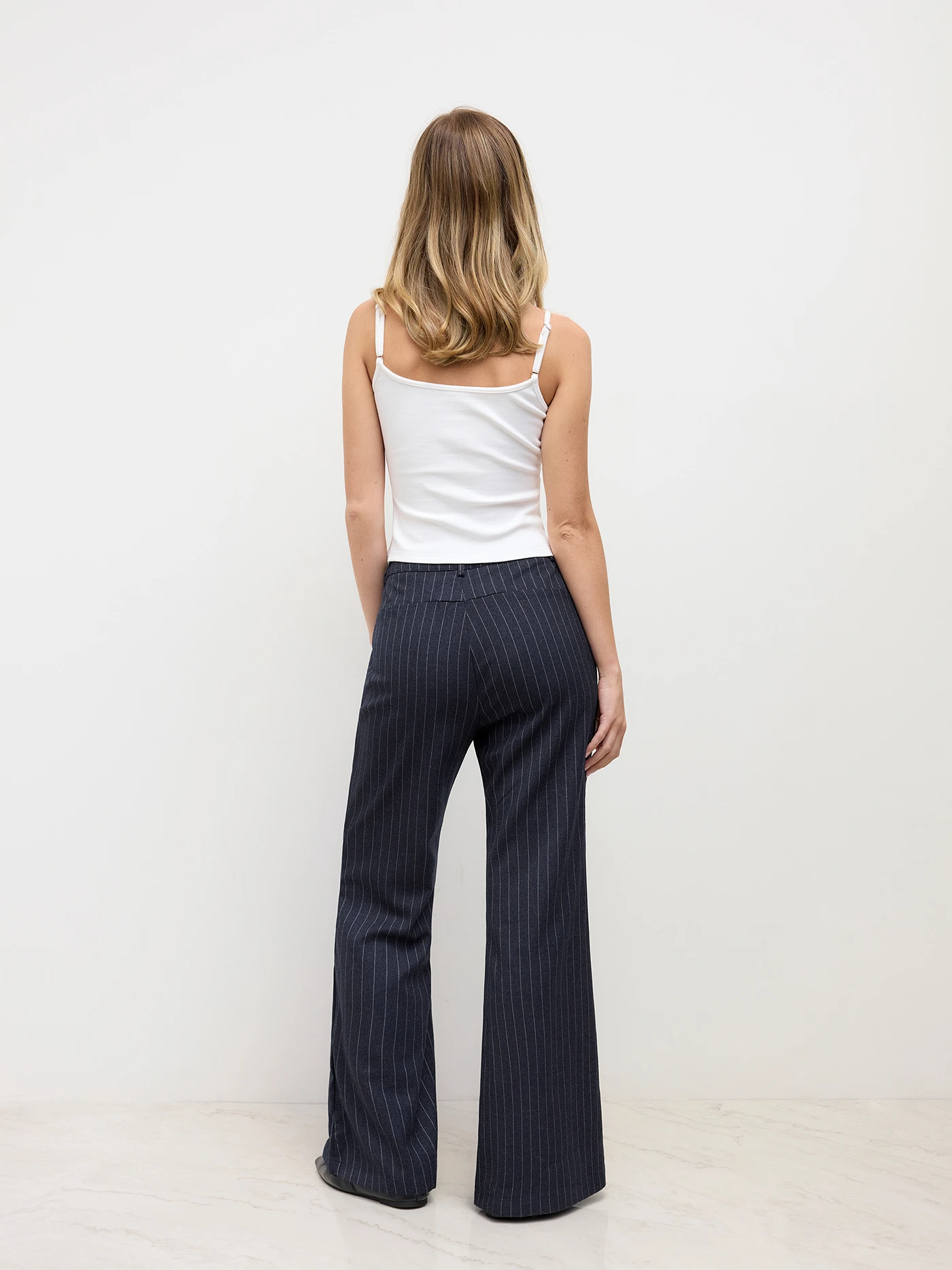 6062-belted-flared-pinstripe-trousers-1.webp