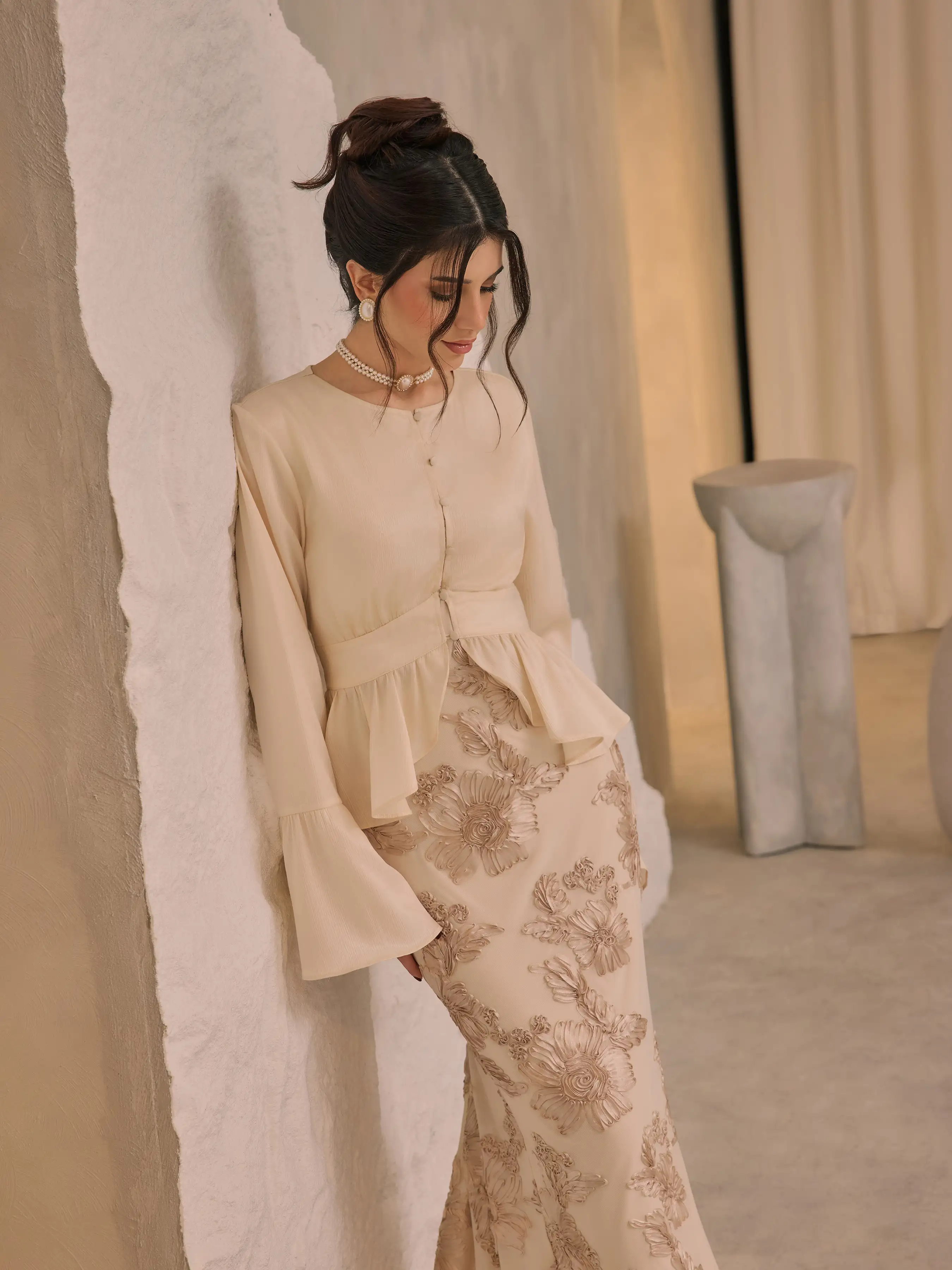 6179-round-neckline-ruffle-hem-blouse-1.webp