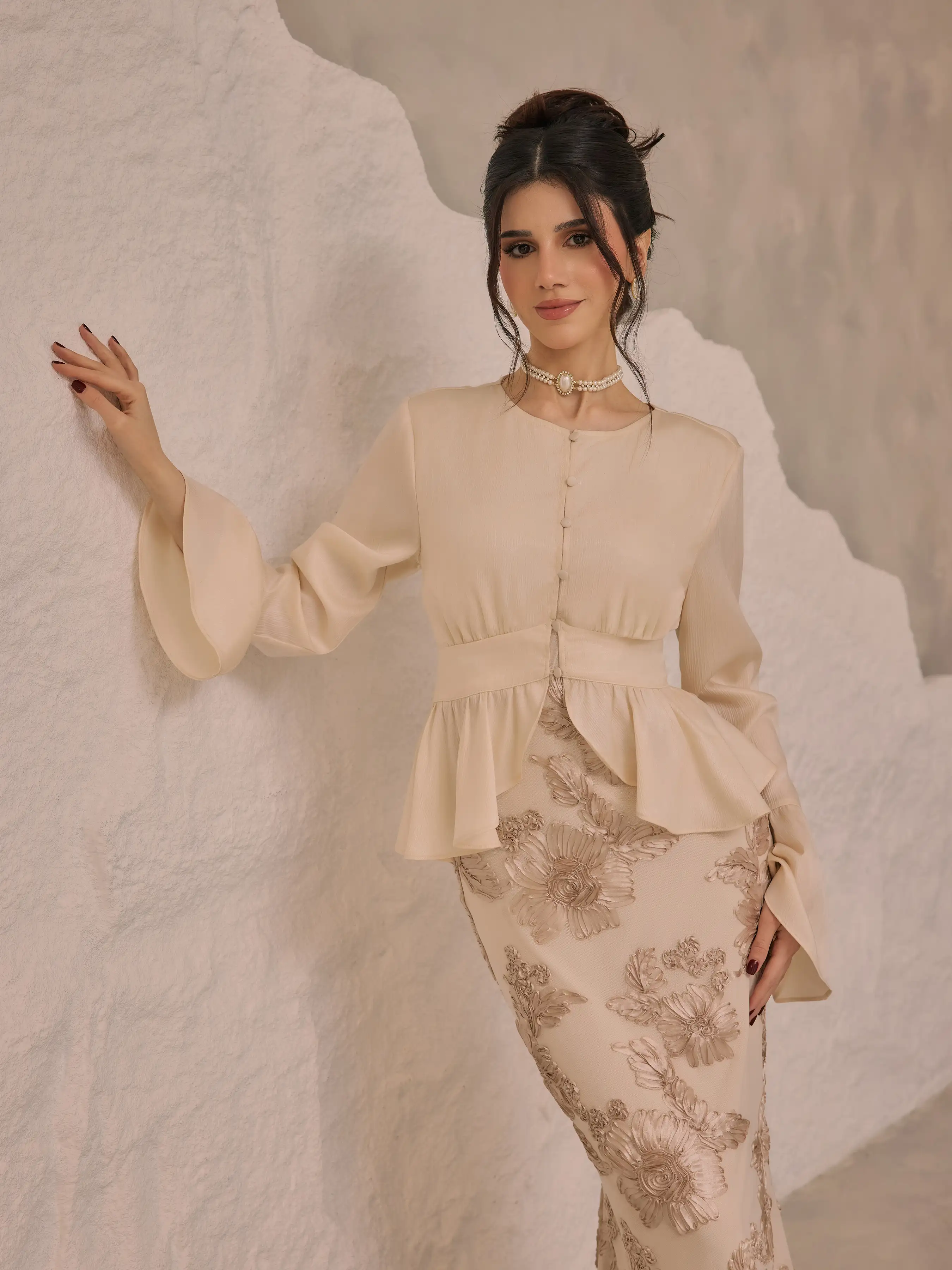 6179-round-neckline-ruffle-hem-blouse-1.webp