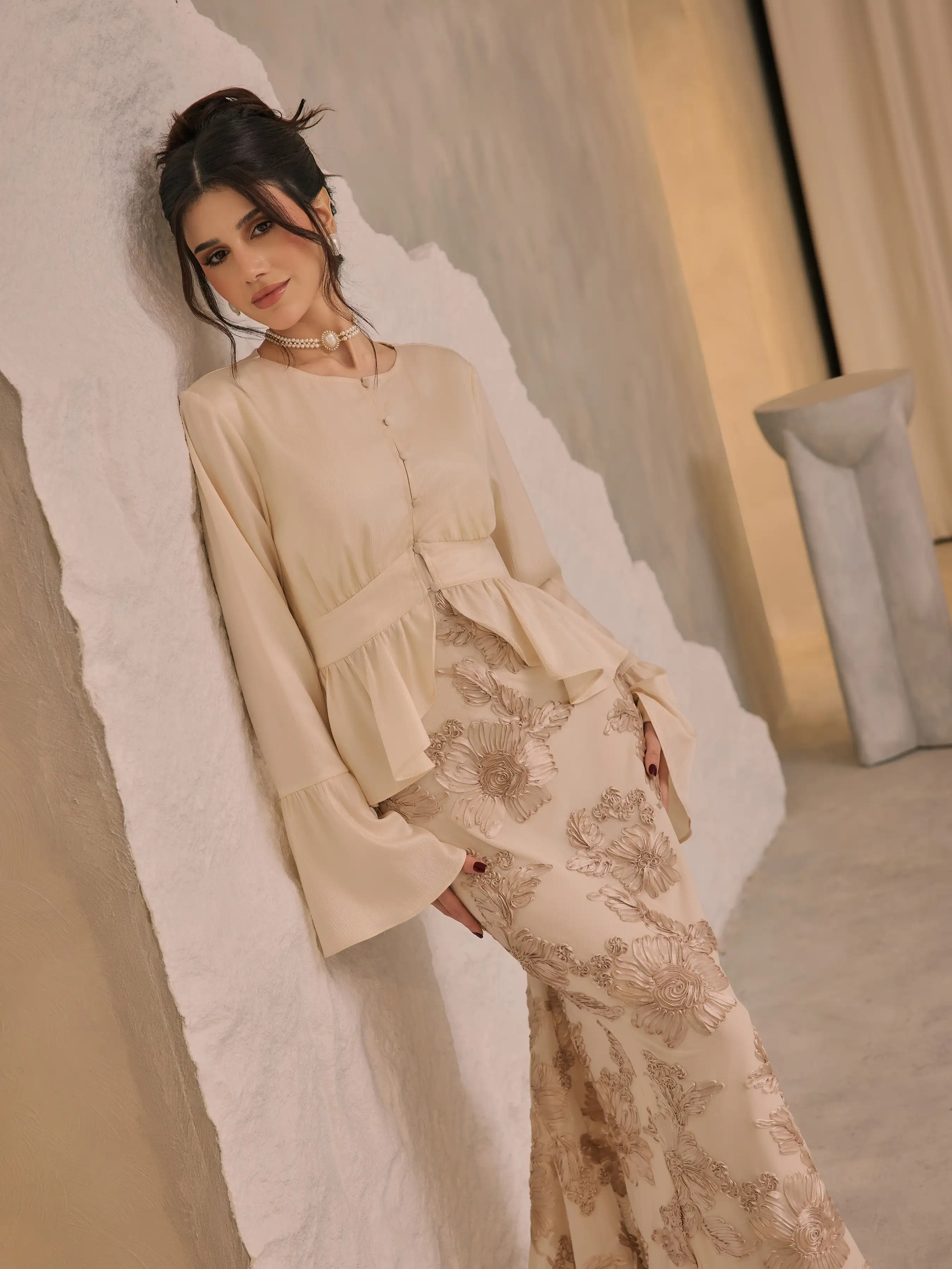 6179-round-neckline-ruffle-hem-blouse-1.webp