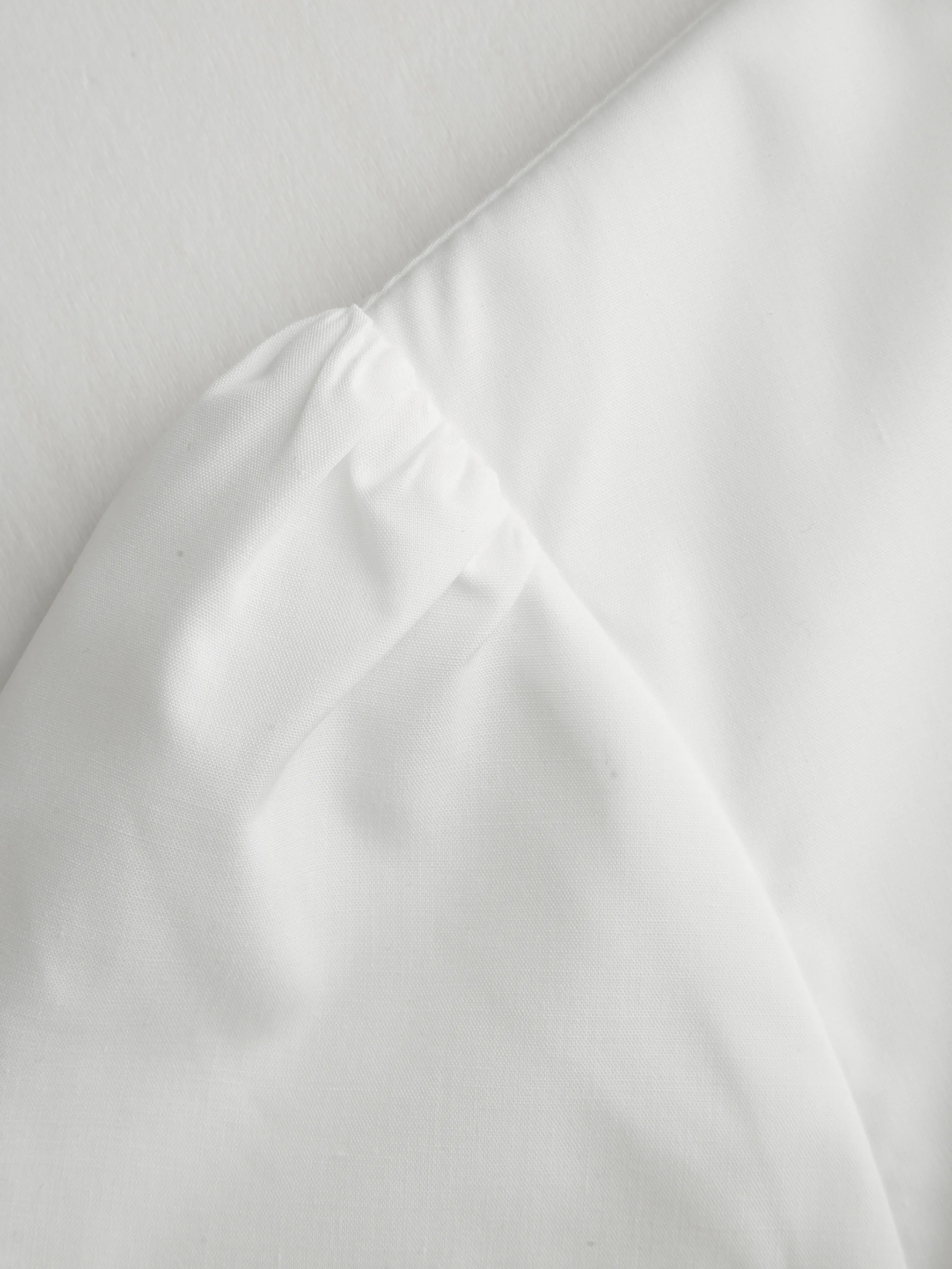 6296-cotton-blend-broderie-anglaise-trim-pleated-blouse-1.webp