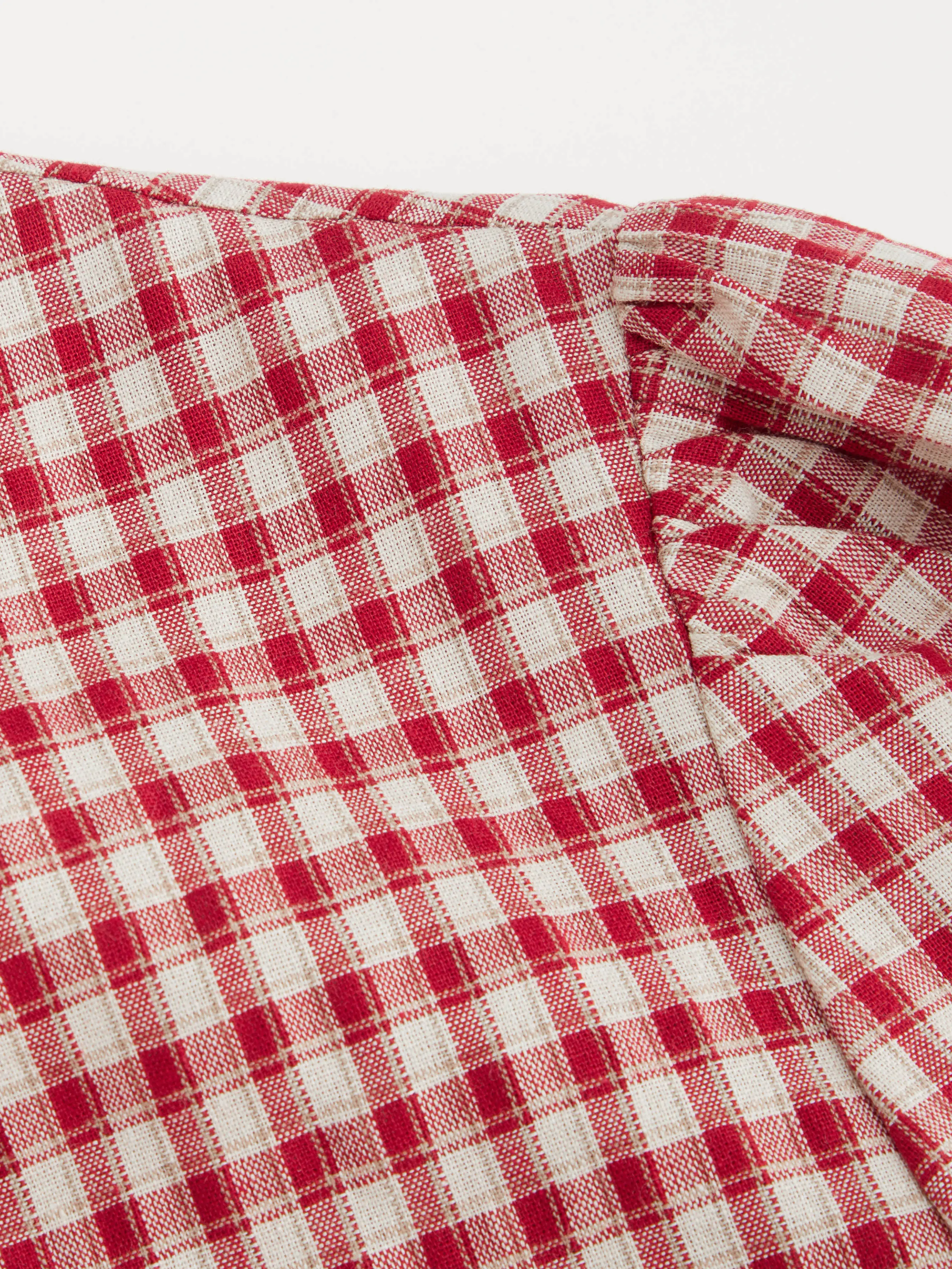 7140-100-cotton-round-neckline-gingham-tie-front-ruffle-hem-long-sleeve-blouse-curve-plus-1.webp
