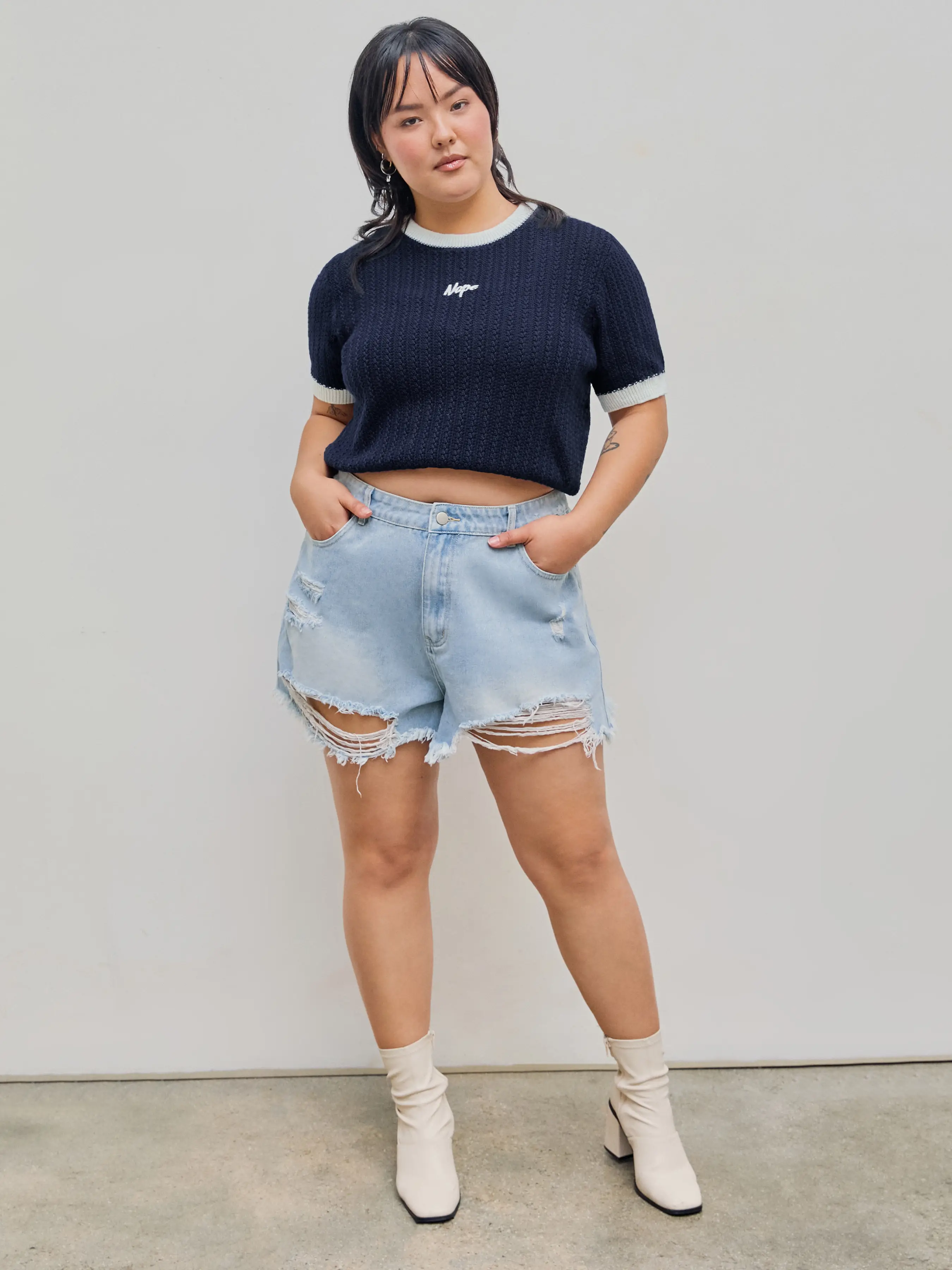 7493-tassels-ripped-pocket-jean-shorts-curve-plus-1.webp