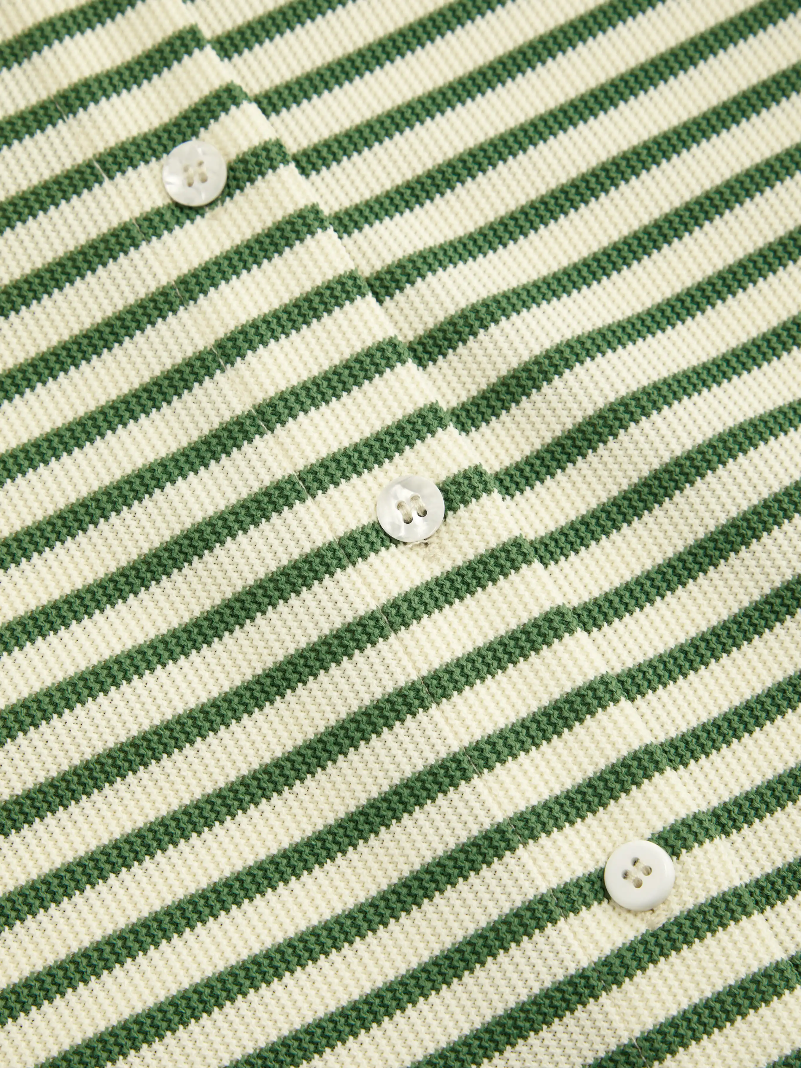 7626-polo-collar-stripe-button-through-tee-1.webp