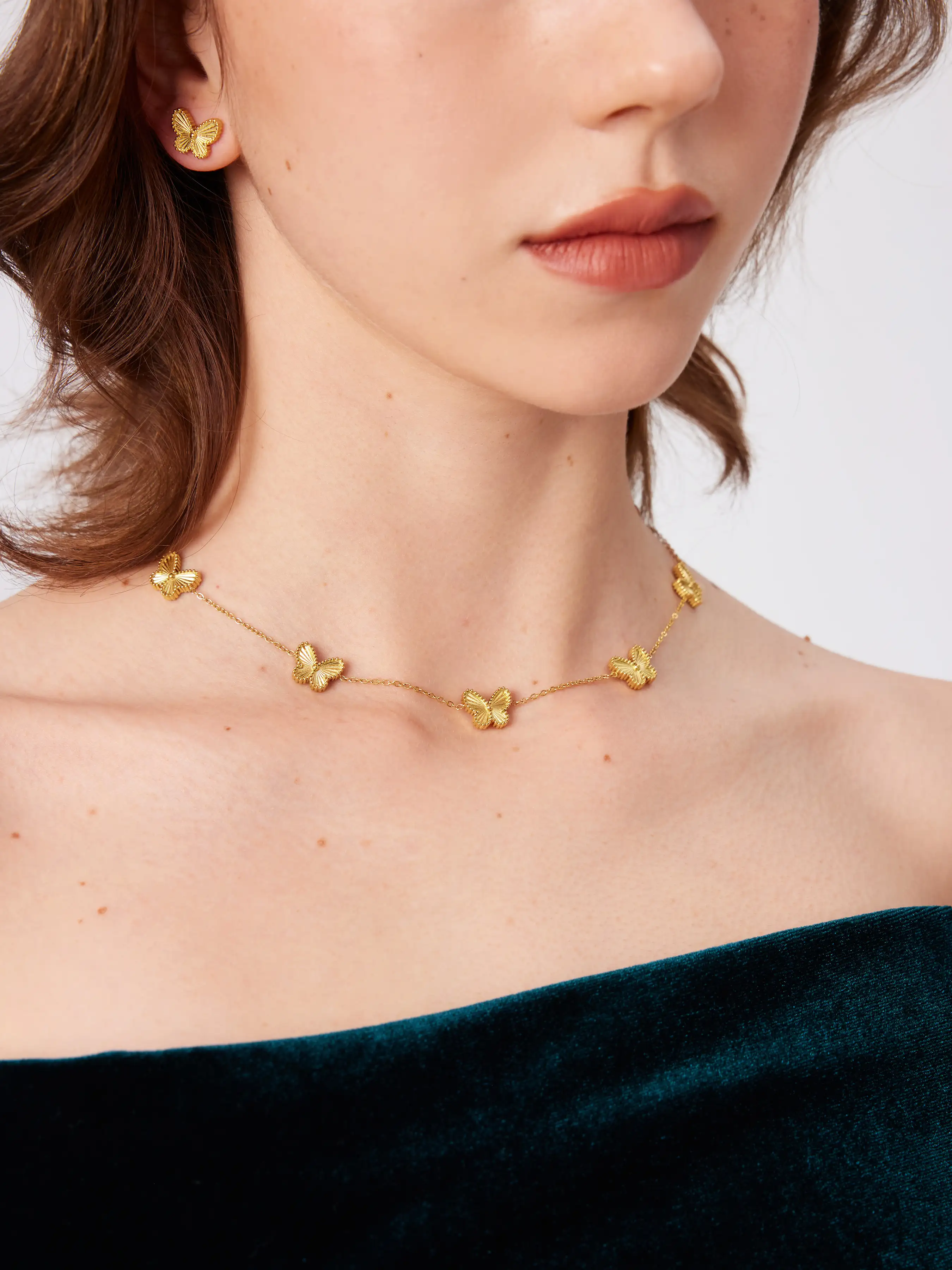 8825–butterfly-18k-gold-plated-stainless-steel-chain-necklace-stud-earrings-set-1.webp
