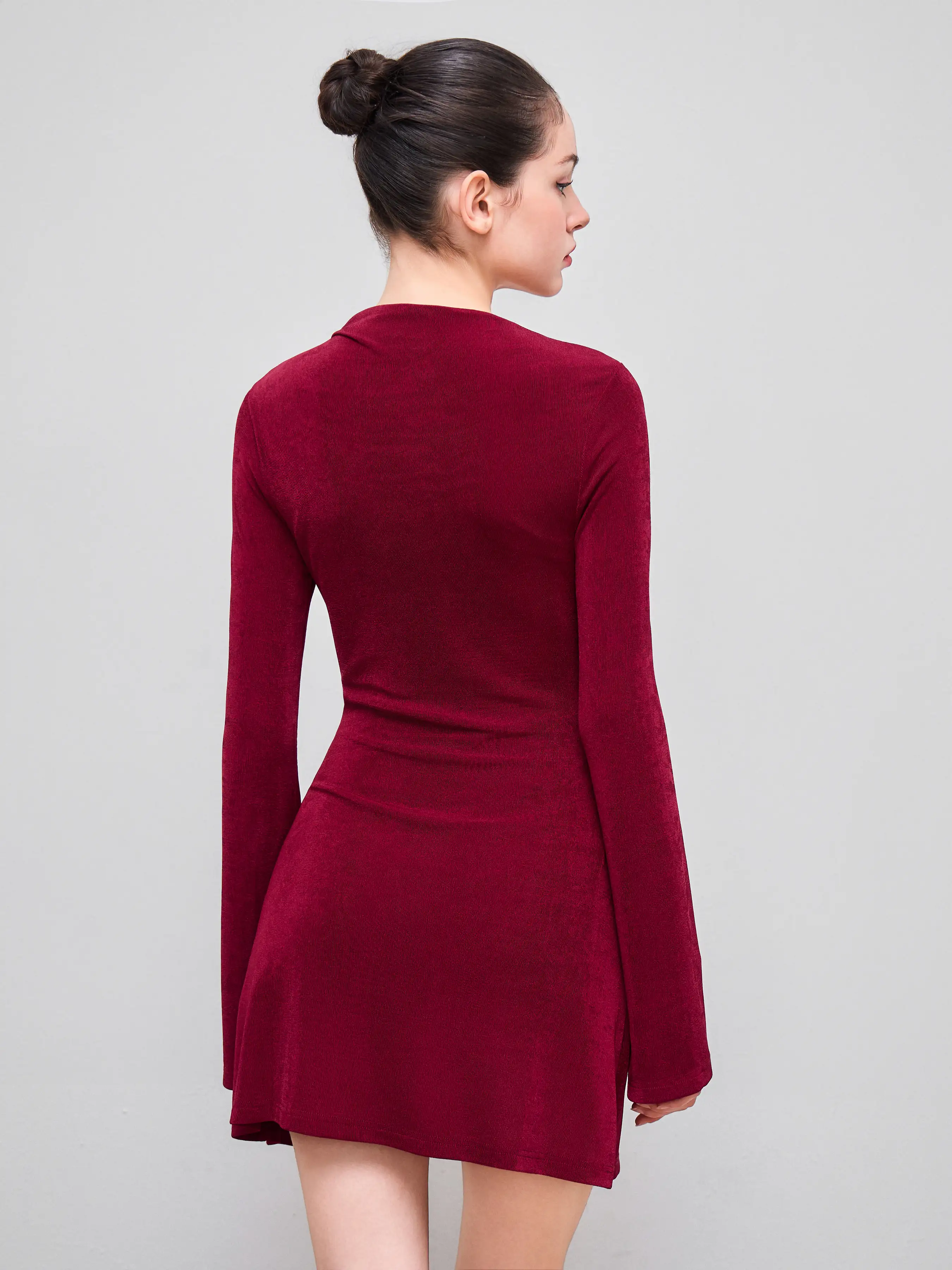 8946-asymmetrical-neck-ruched-bell-sleeve-mini-dress-1.webp