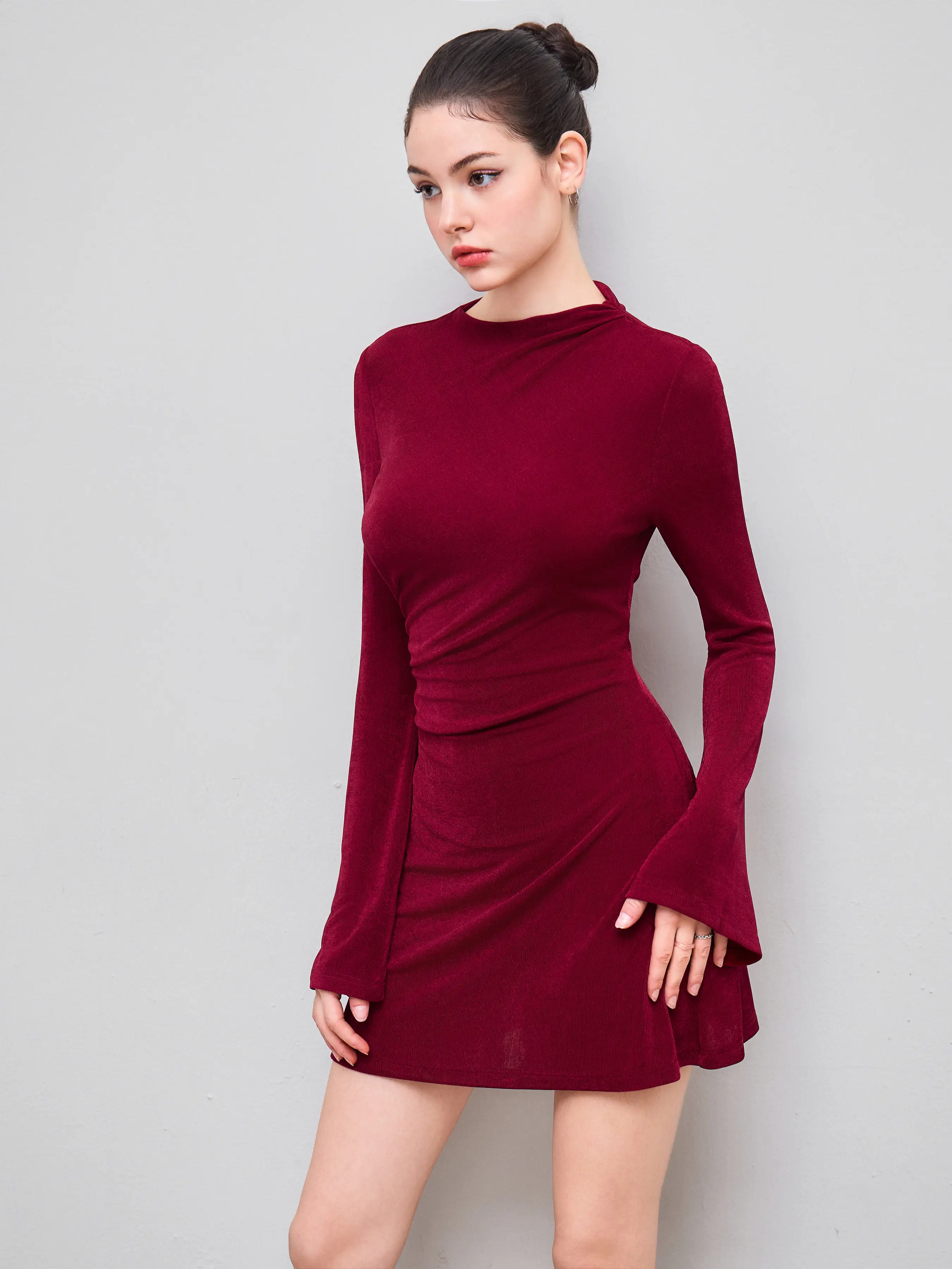 8946-asymmetrical-neck-ruched-bell-sleeve-mini-dress-1.webp